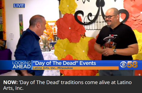 Artistic Director being interviewed by a journalist in the gallery