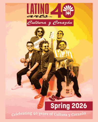 The Band QUITAPENAS smiling in a group and holding instruments